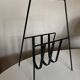 Modernist magazine rack French work 1950 in iron and brass