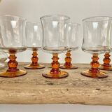 6 small amber stemmed glasses