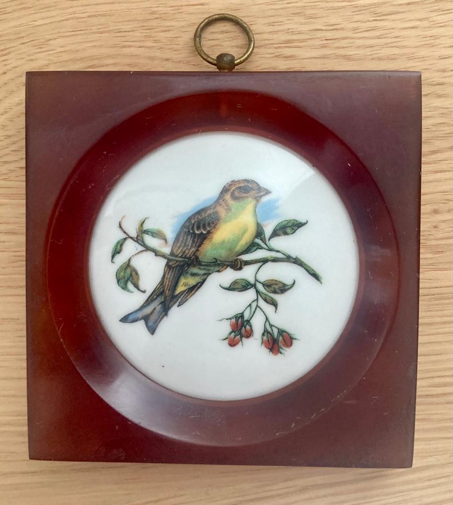 Porcelain and bakelite frame