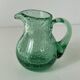 Miniature glass jug or pitcher with bubble effect, mint water, signed Biot.