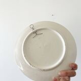 Decorative ceramic plate with sun face