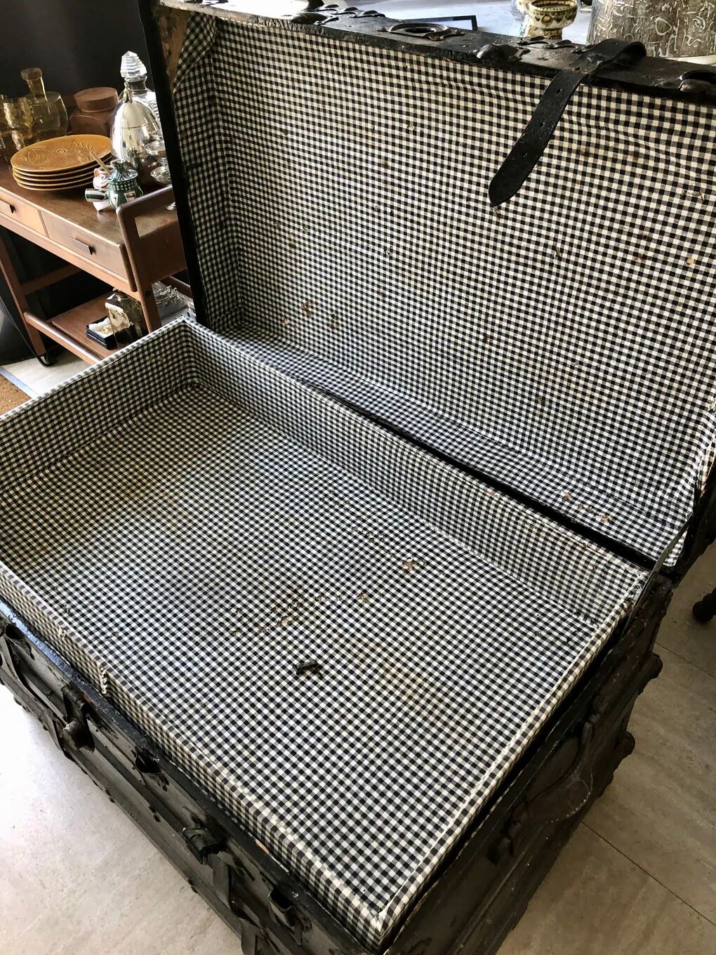 Black ancient travel trunk, 19th