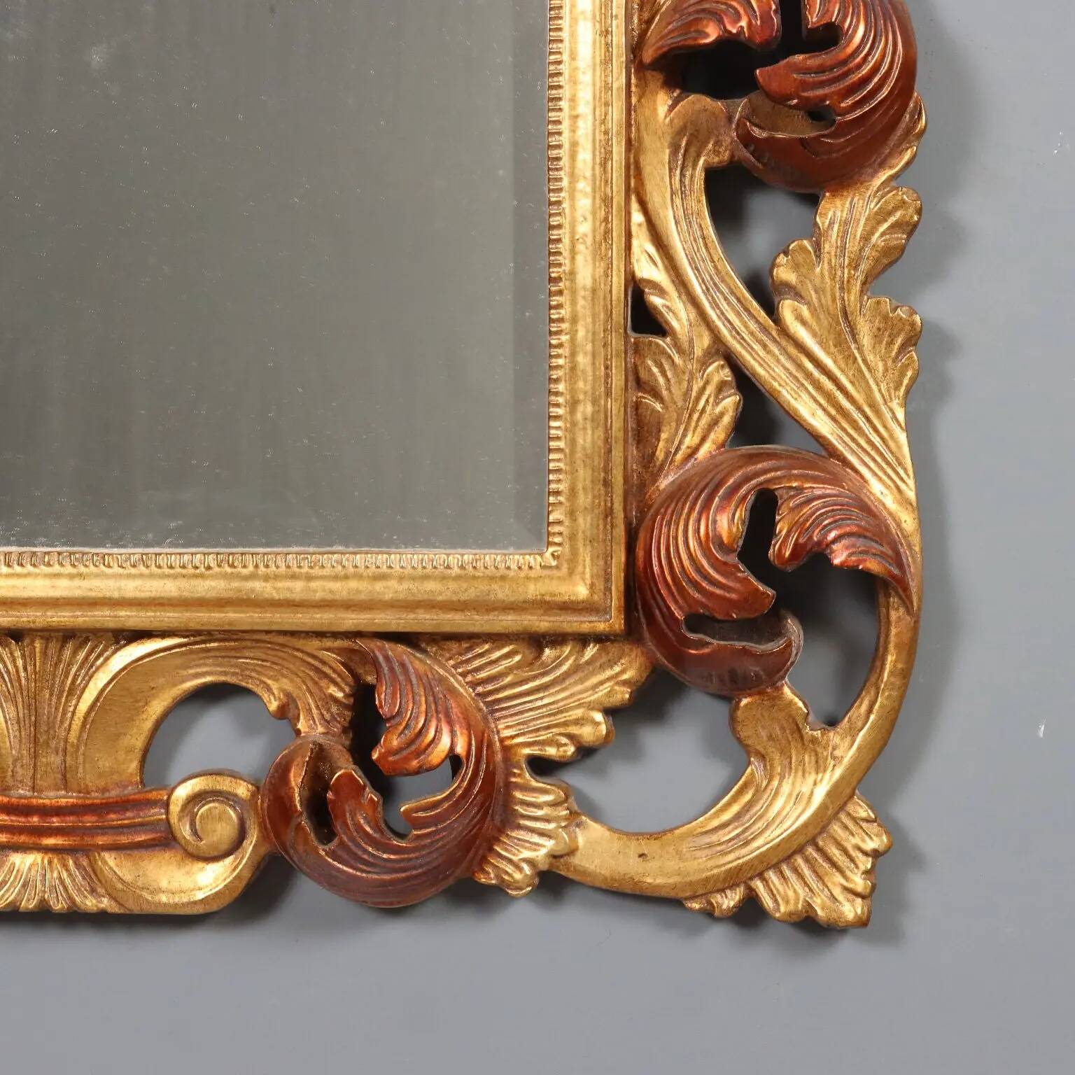 Antique baroque style mirror in carved wood, Italy, 20th century.