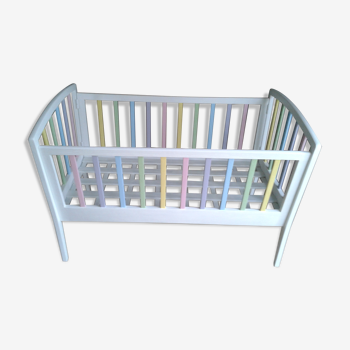 Children's cot in painted wood