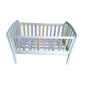 Children's cot in painted wood