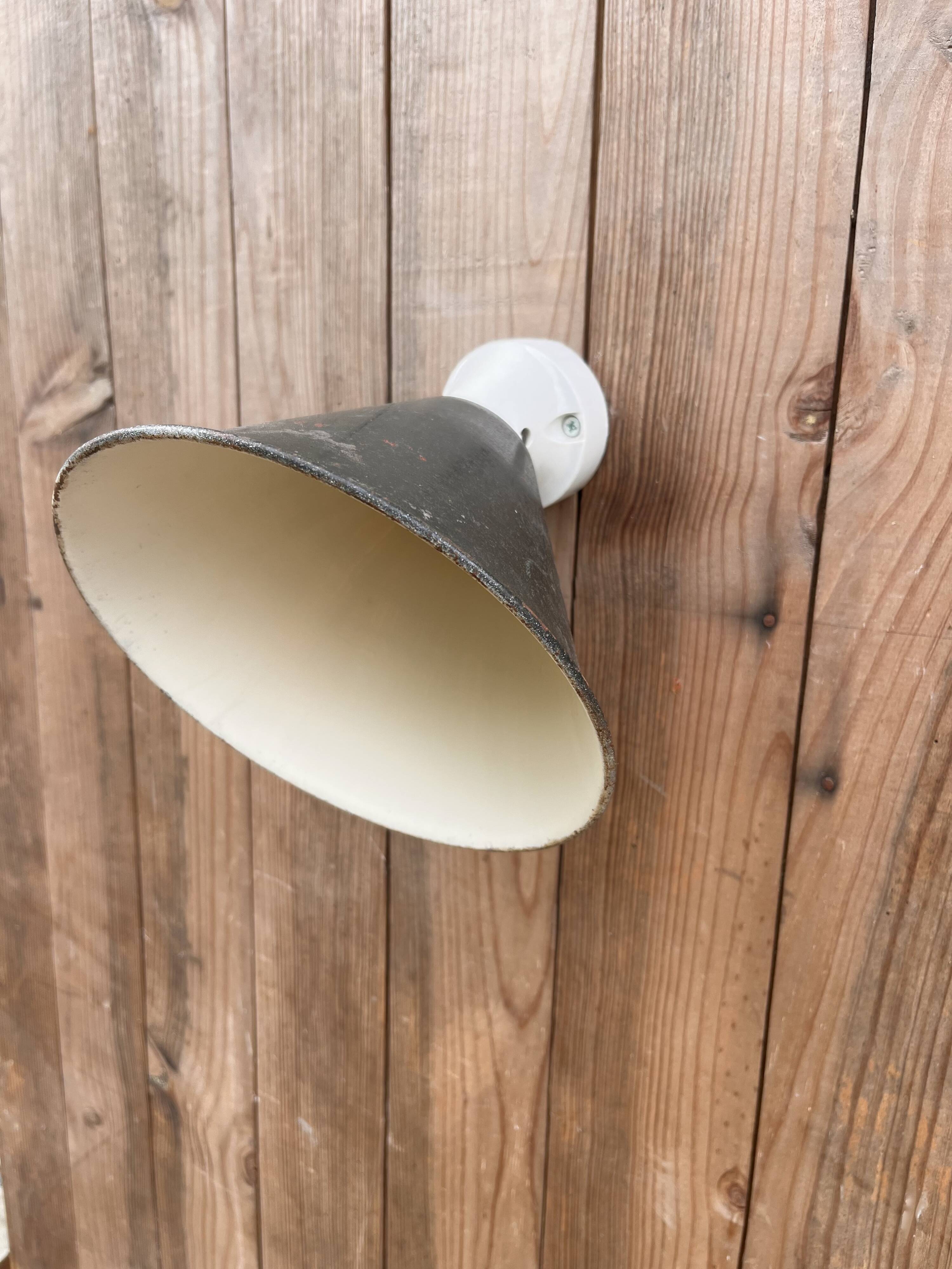 Conical wall light on porcelain base