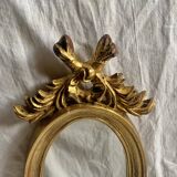 Vintage Empire style wall mirror in gold resin