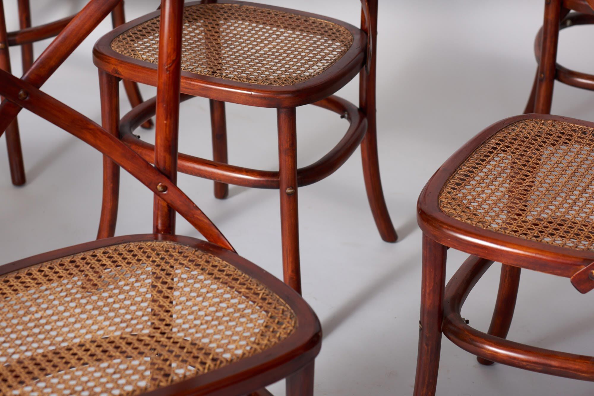 Set of bended wooden chairs