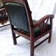 Paire de fauteuils style colonial bois et cuir de chèvre