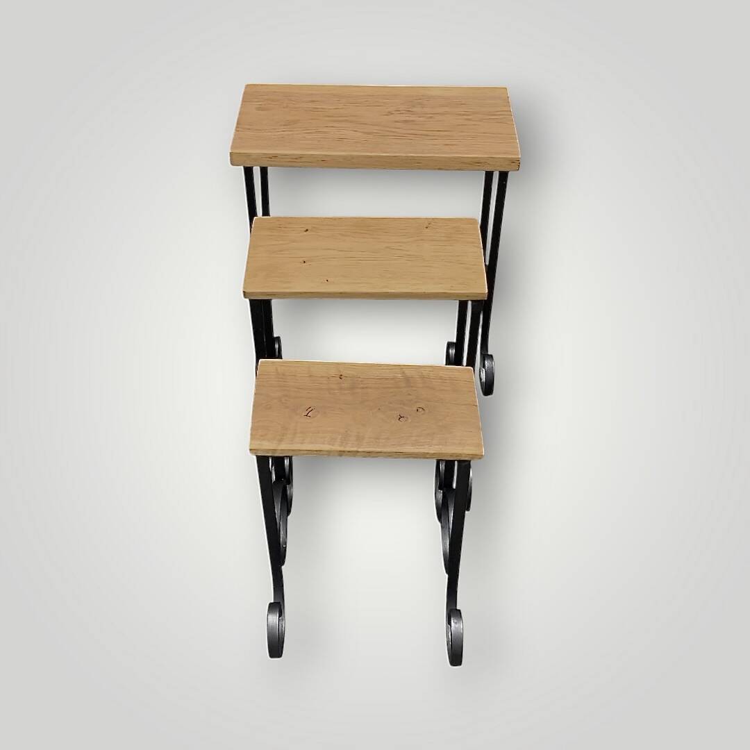 Antique wooden and wrought iron nesting tables – circa 1950