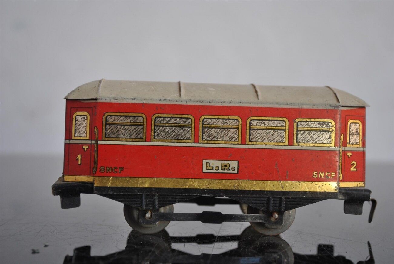 Tin litho brand LR spring-loaded toy locomotive