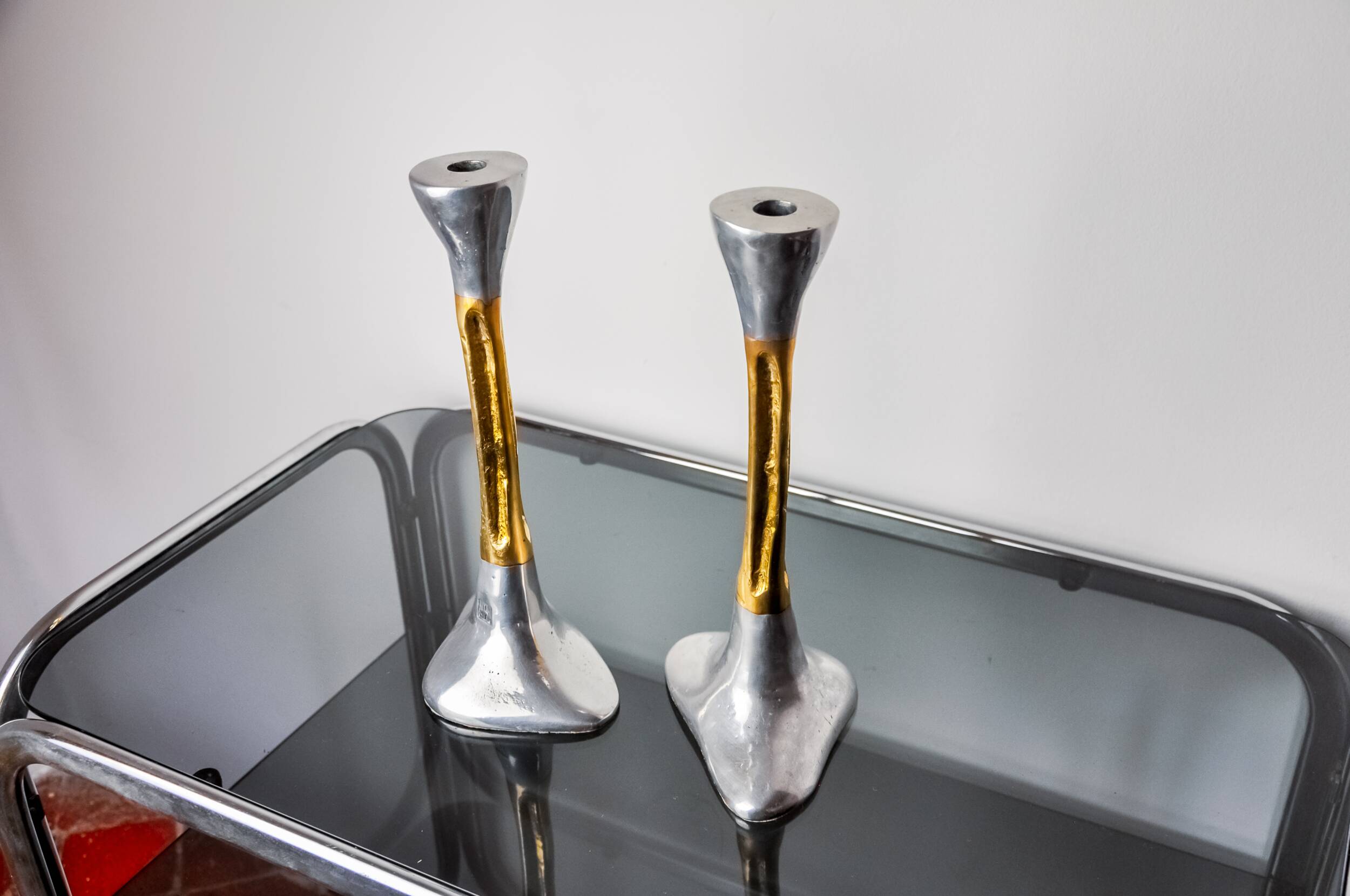 Pair of Brutalist candlesticks by David Marshall, bronze and aluminum, Spain, 1970