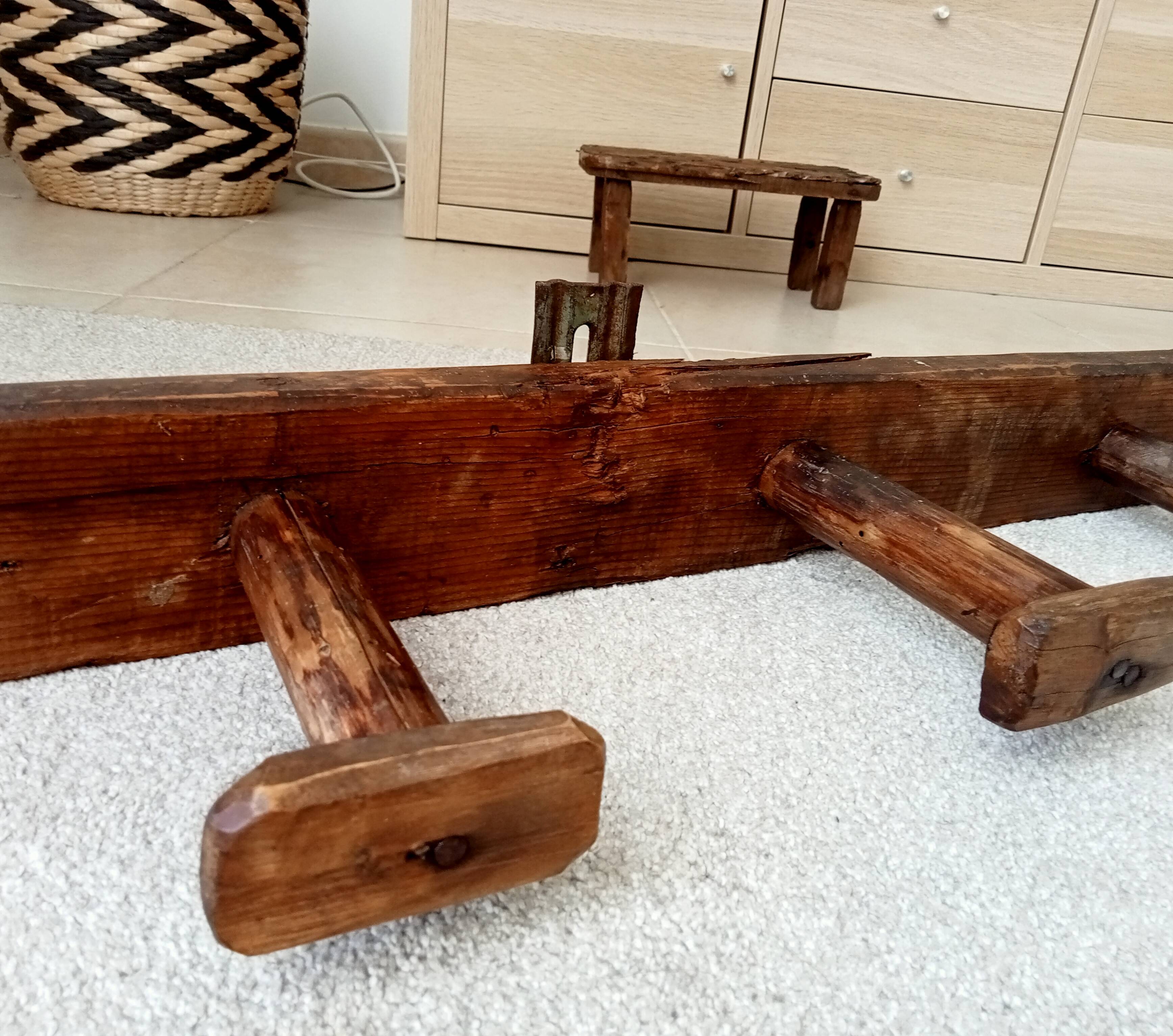 Old wall-mounted coat rack from a stable, folk art.