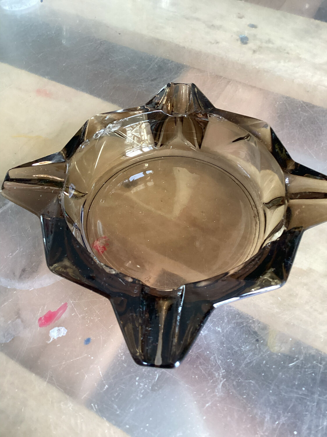 Empty ashtray vintage smoked glass pocket