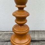 Turned wood lamp with flower shade