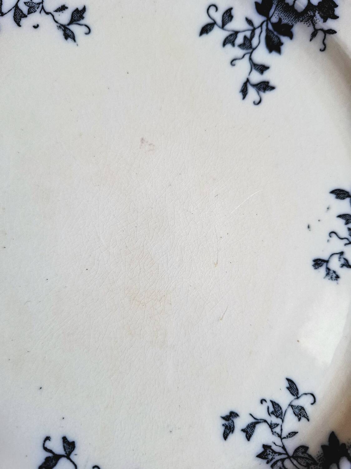 Antique earthenware dessert plates accompanied by a dish