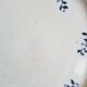 Antique earthenware dessert plates accompanied by a dish
