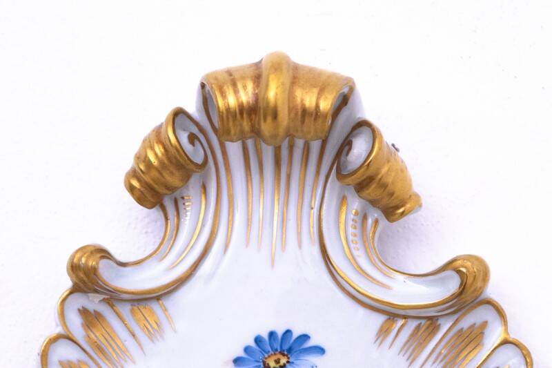 A pair of porcelain wall lamps from Capodimonte, Italy.