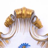 A pair of porcelain wall lamps from Capodimonte, Italy.