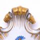 A pair of porcelain wall lamps from Capodimonte, Italy.