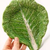 Trompe l'oeil cup bright green cabbage leaf in slip