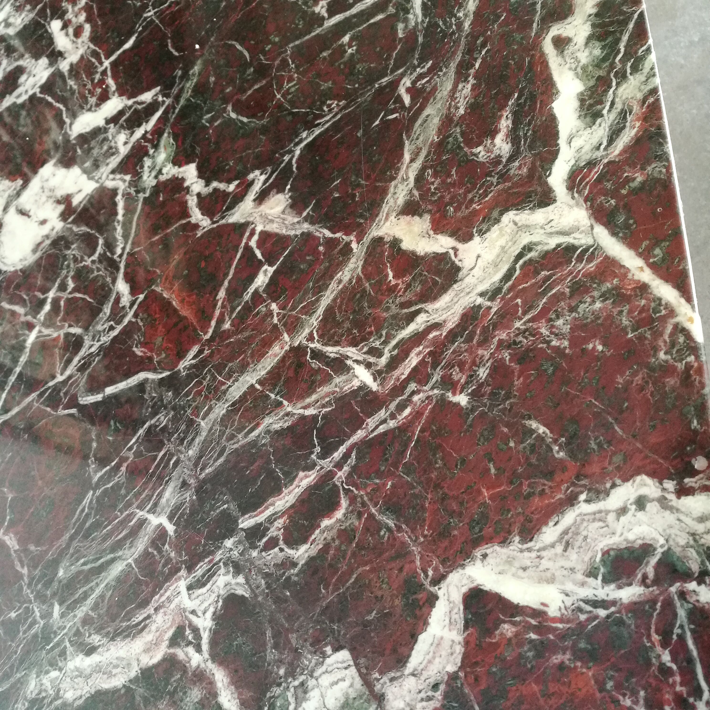 Table, chrome foot, red marble
