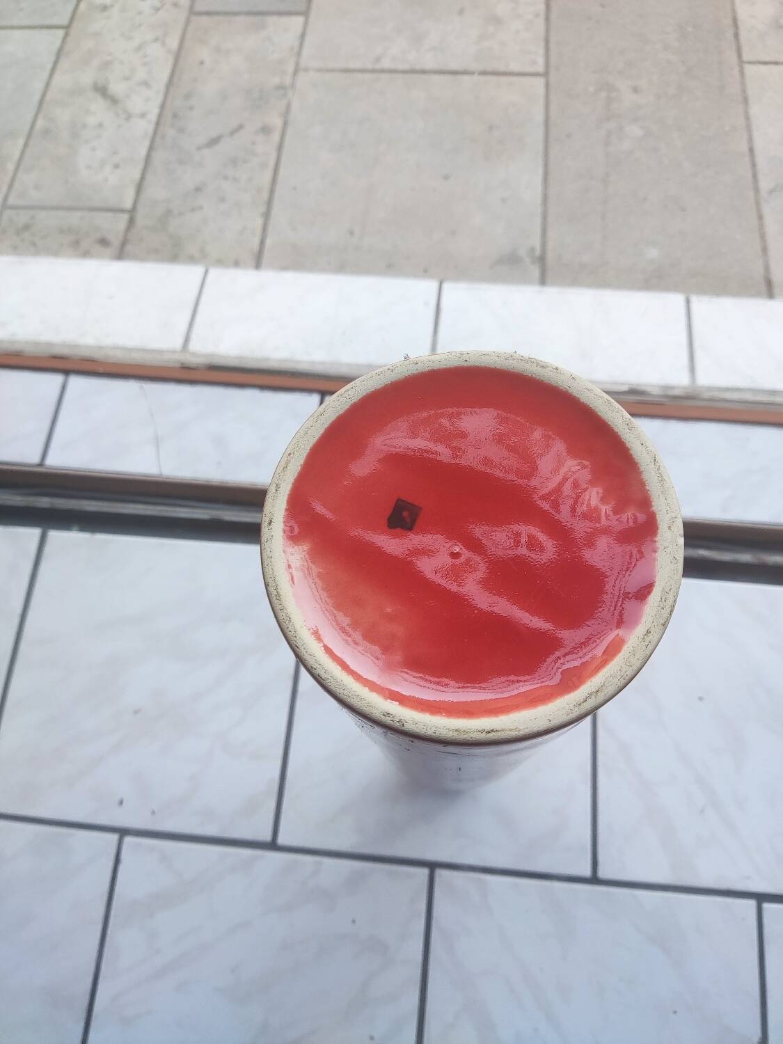 Red glazed stoneware vase