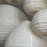 Suspension in rattan and natural japanese linen in the shape of a drop