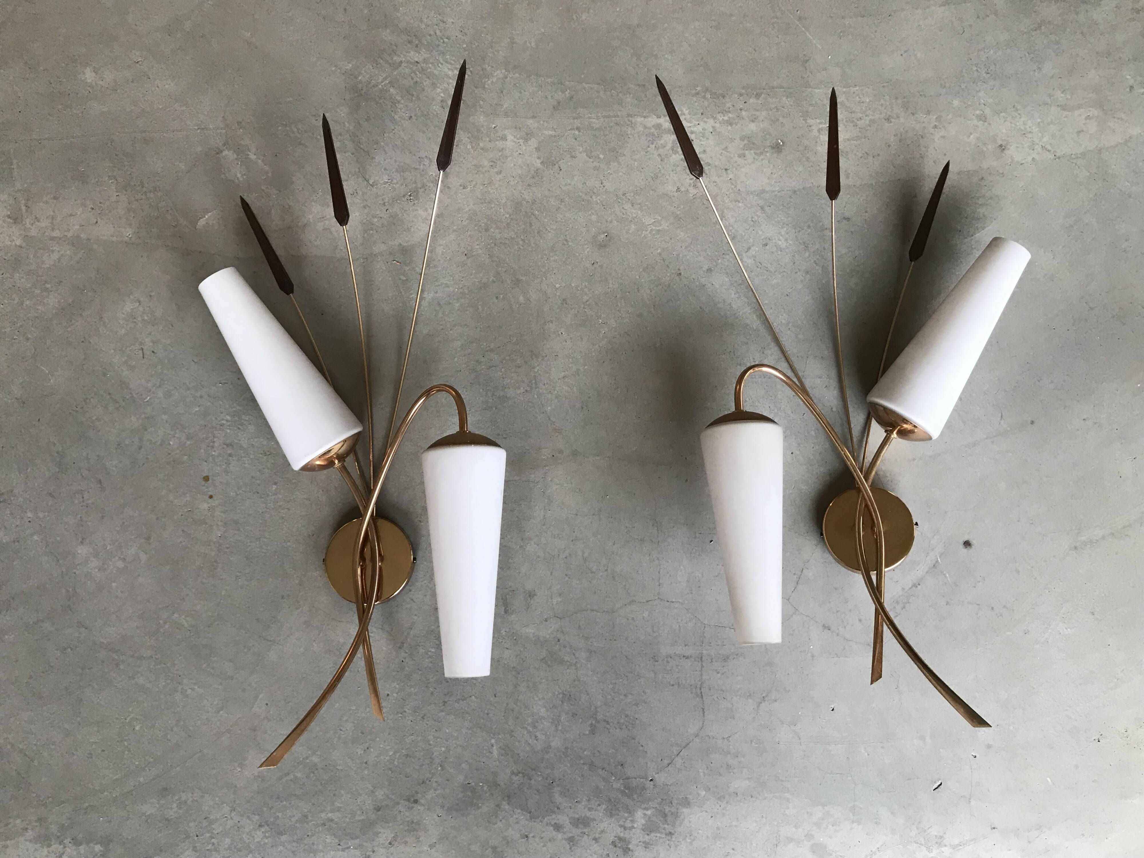 Pair of brass wall lights, circa 1950.