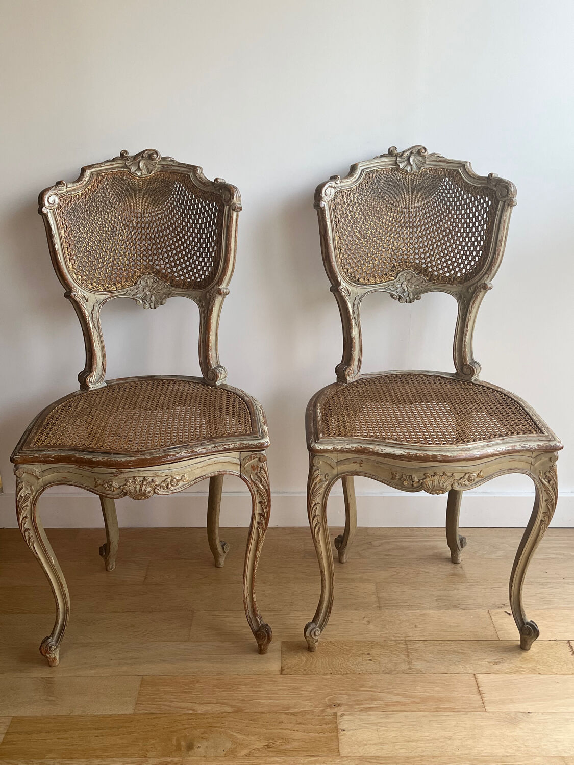 2 caned chairs in Louis XV Regency style