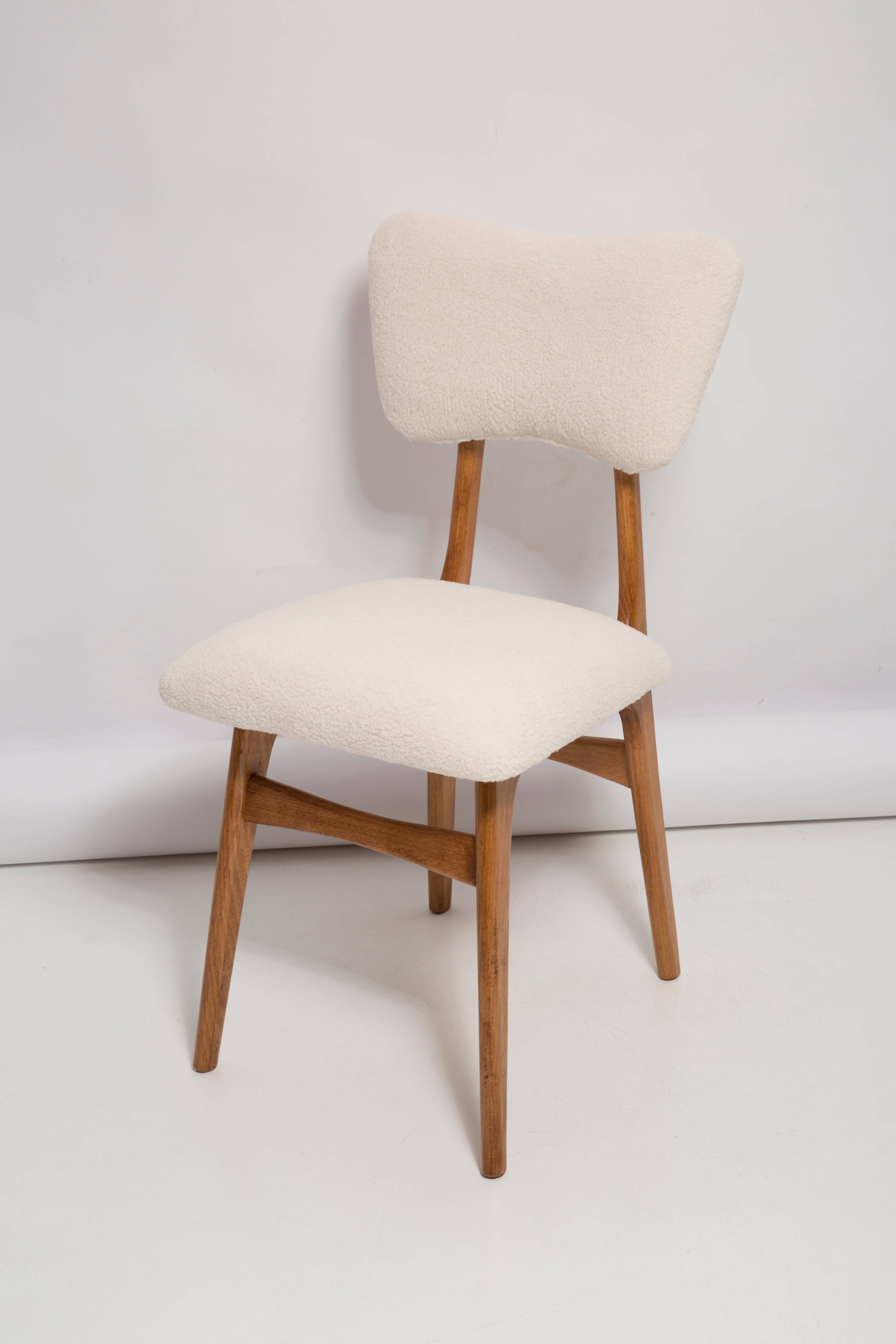 Butterfly chair in beech wood and cream boucle, Europe, 1960