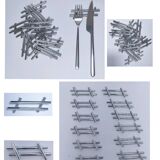Twelve 70s design metal knife holders