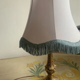 Vintage Neo-Rococo bedside lamp with fringed shade.