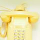 Vintage beige phone with keys