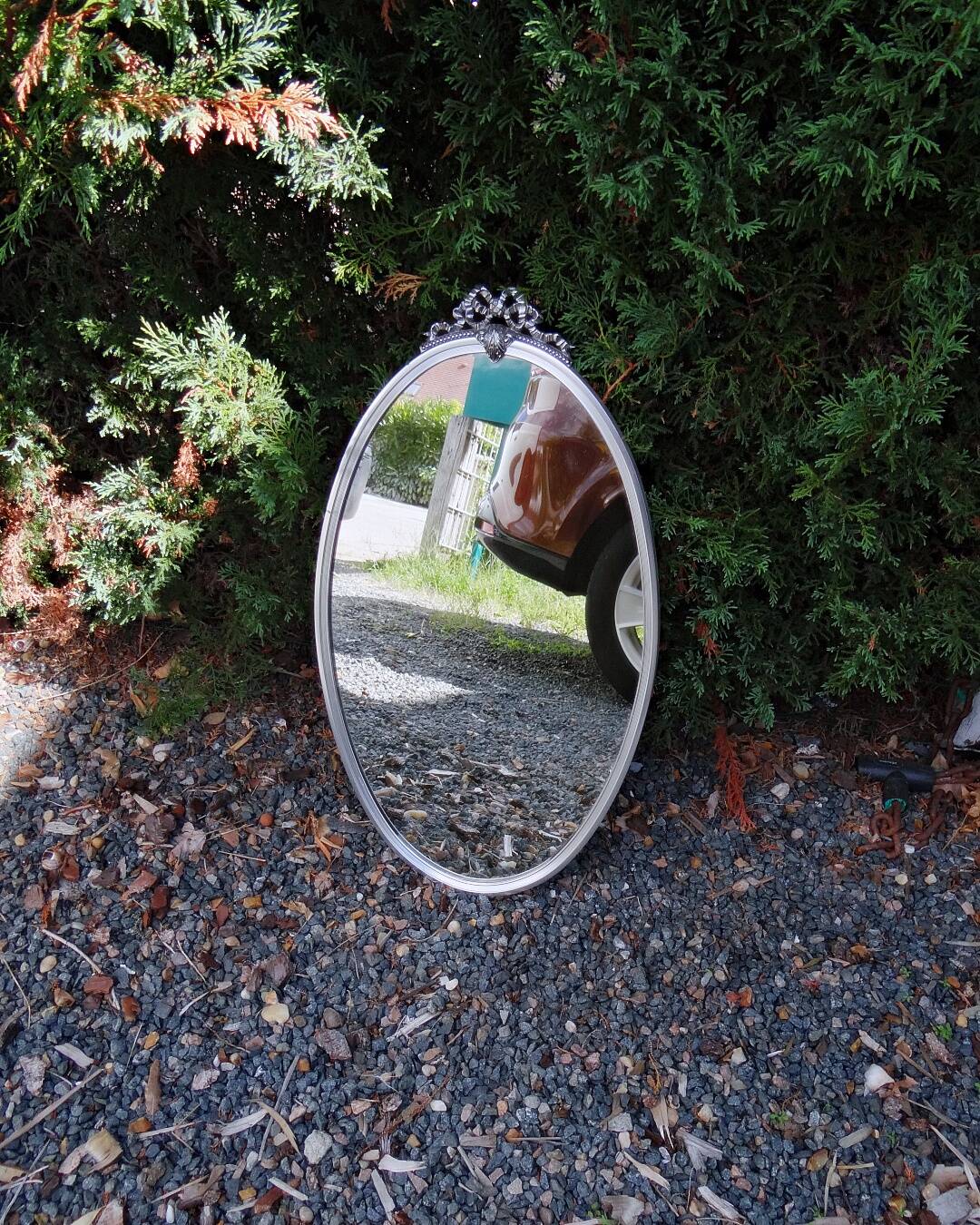 Oval mirror 66x37 Louis XVI style knot in vintage silver metal from the 70s