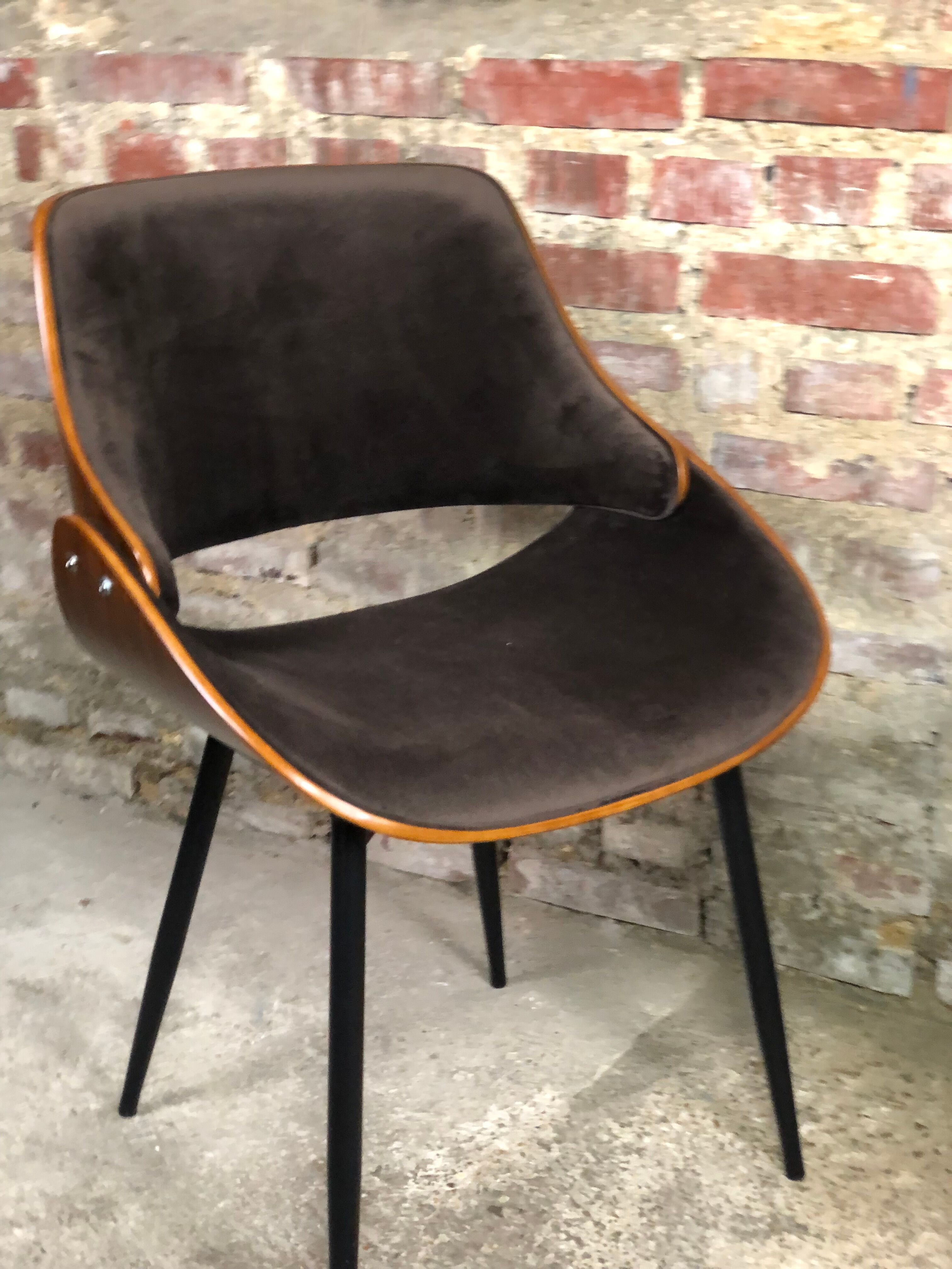 Scandinavian style chairs in curved plywood covered with brown fabric