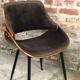 Scandinavian style chairs in curved plywood covered with brown fabric
