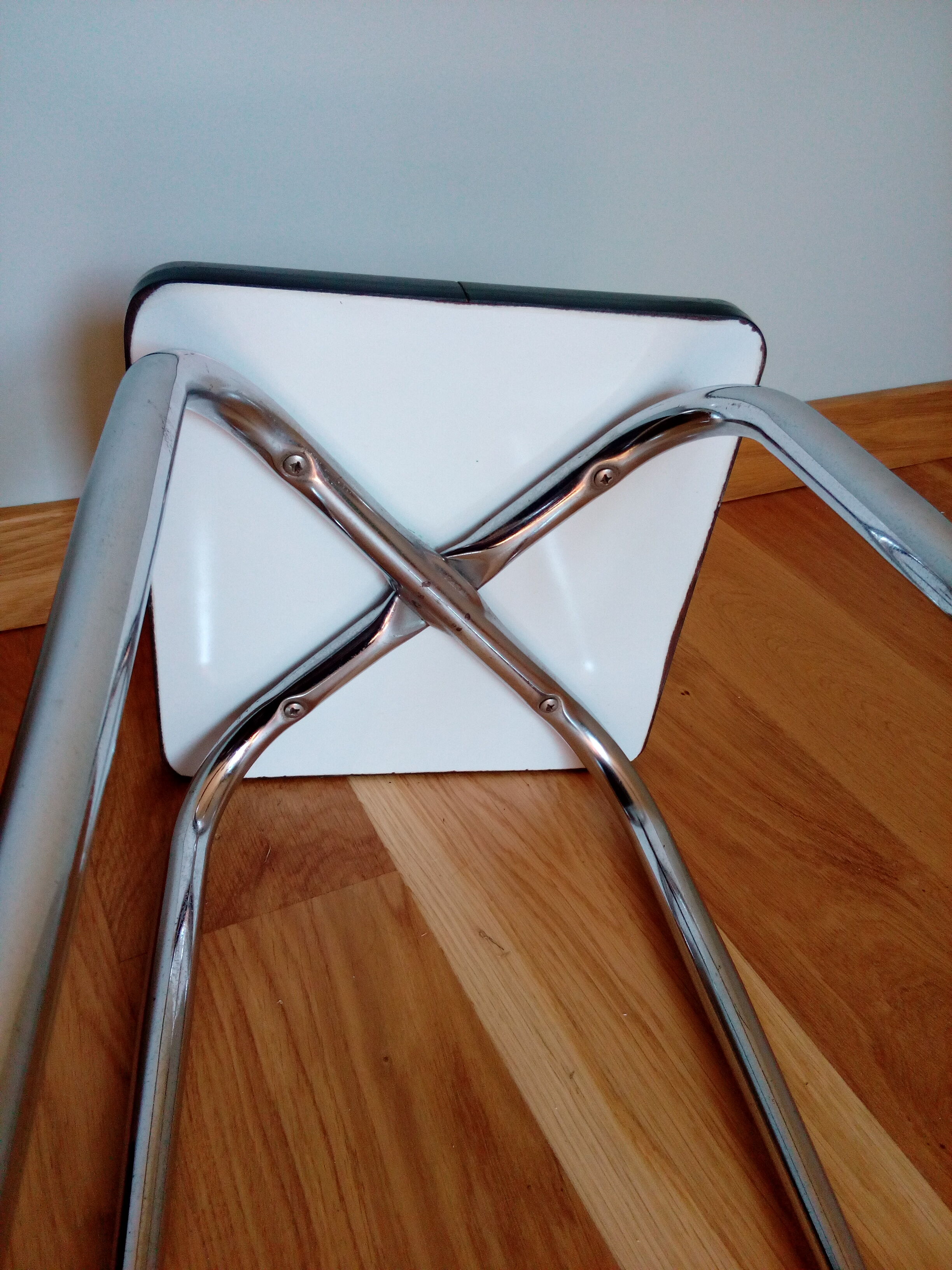 Yellow formica and chrome metal barstool