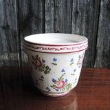 Vintage ceramic pot with hand-painted floral decoration.