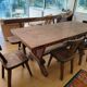 Set table, 4 chairs and a brutalist bench in the Regain style.