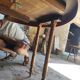 Oval oak table with carved details - known as a hunting table.