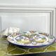 Decorative ceramic plate with griffins