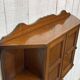 Early 20th-century English wall shelf in walnut.