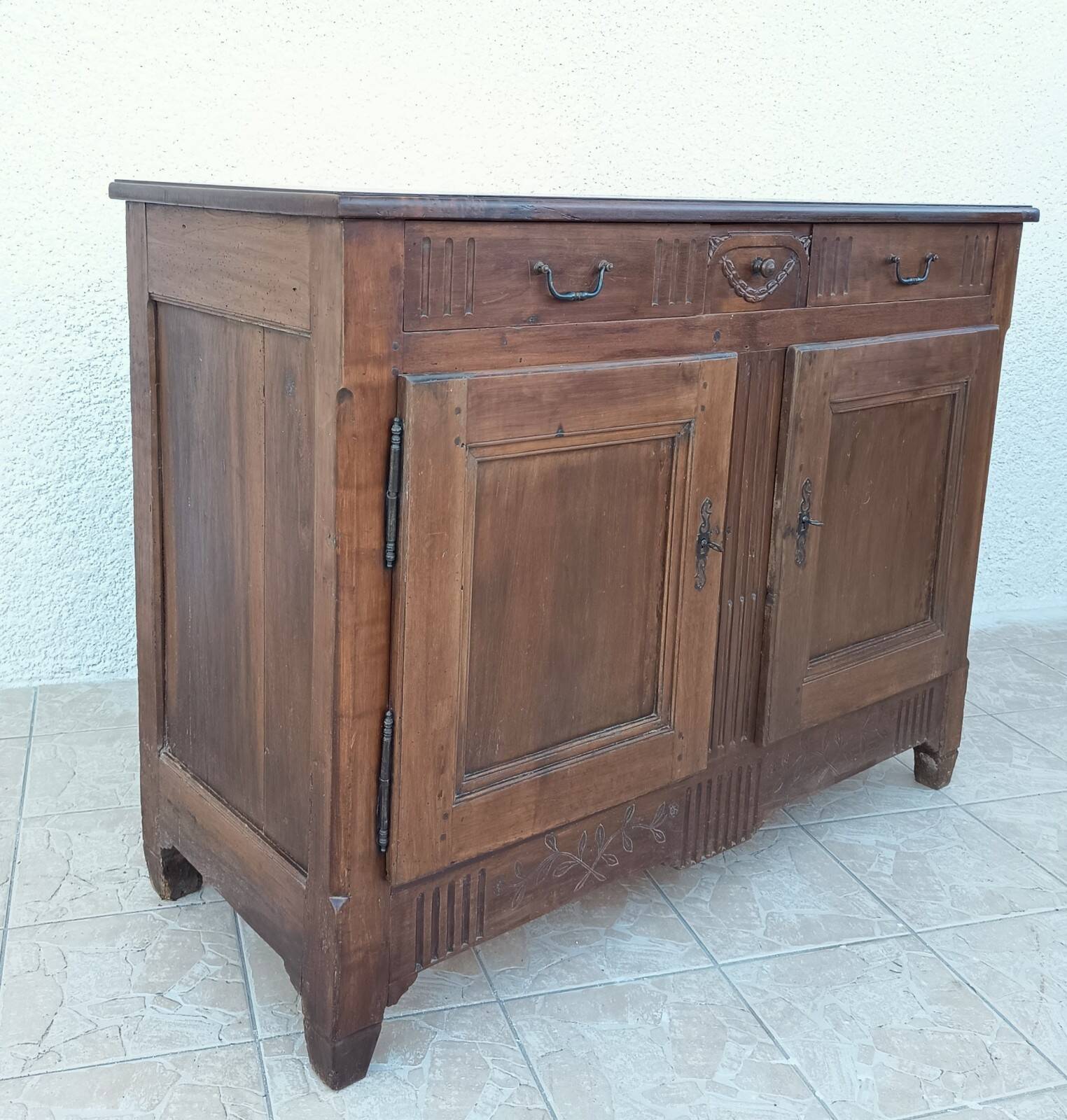 Louis XVI walnut buffet from the 19th century.