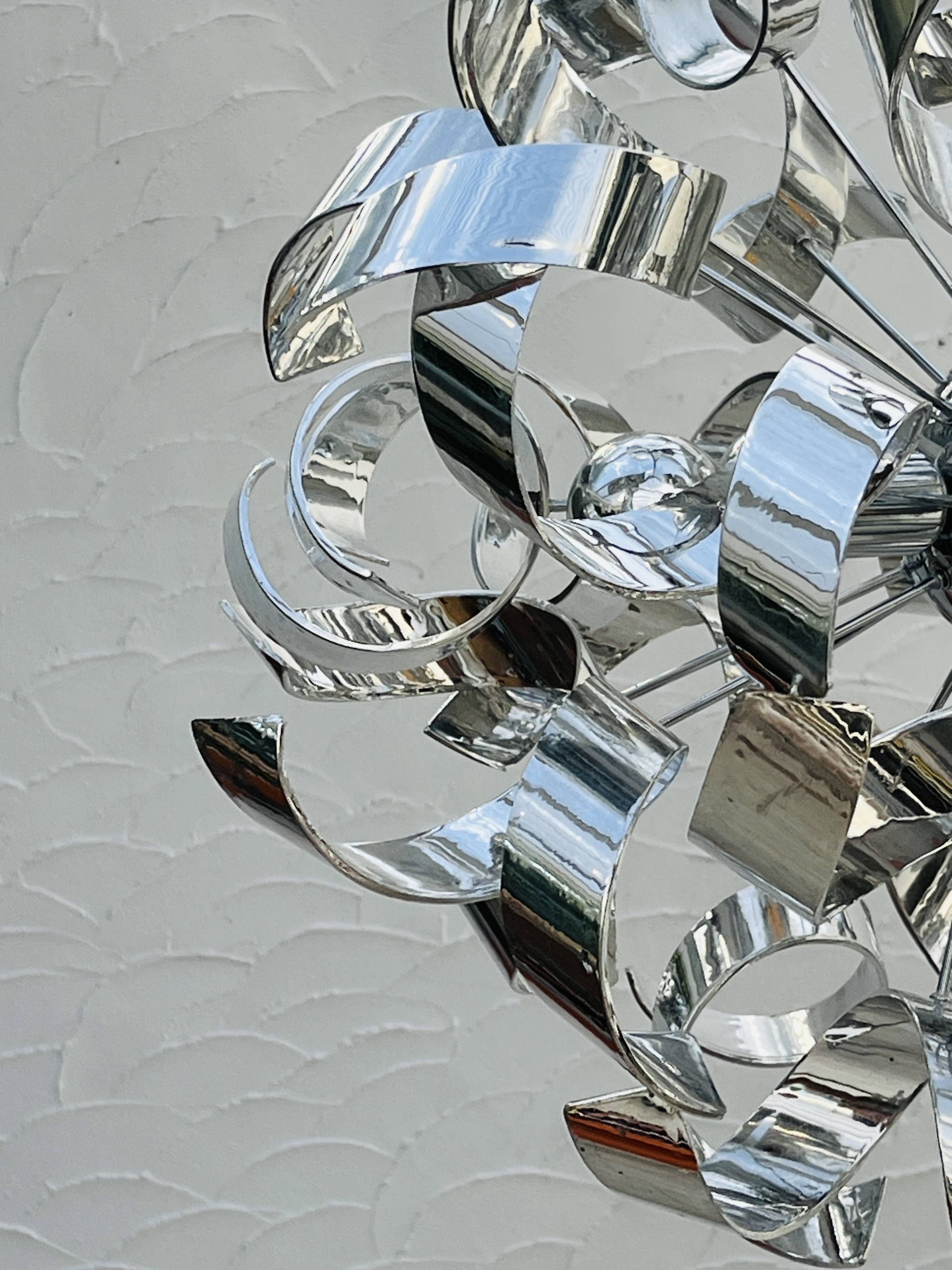 Sculptural chrome suspension design
