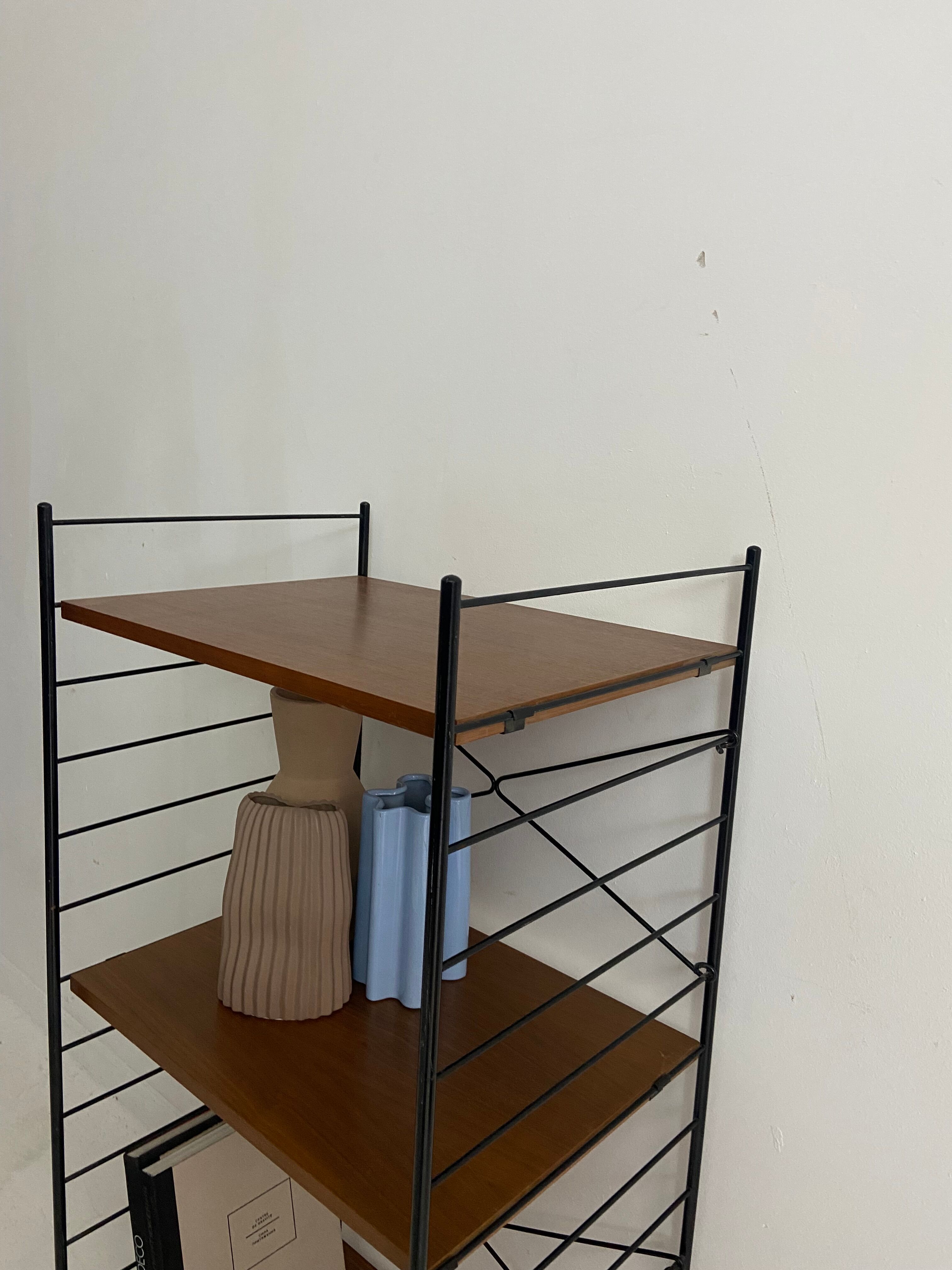 small vintage metal and teak string bookshelf