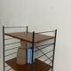 small vintage metal and teak string bookshelf