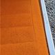 Pair of designer armchairs in orange fabrics and chrome tubes from the 70s