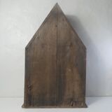 Old niche shelf with glazed statue