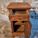 Antique French oak bedside table, early 20th century.